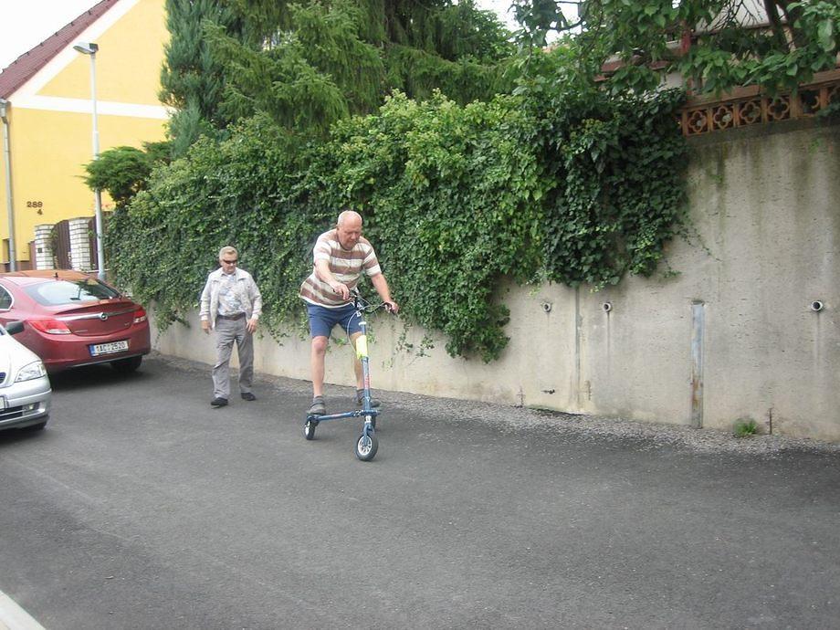9/9/11 Jan is trying the trikke  IMG 4240